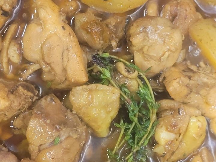 Curry chicken simmered with potato and fresh thyme